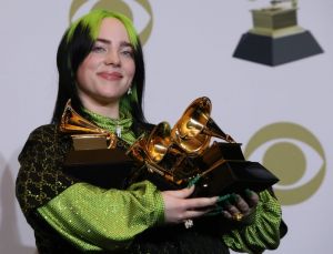 Billie Eilish with Grammys.jpg